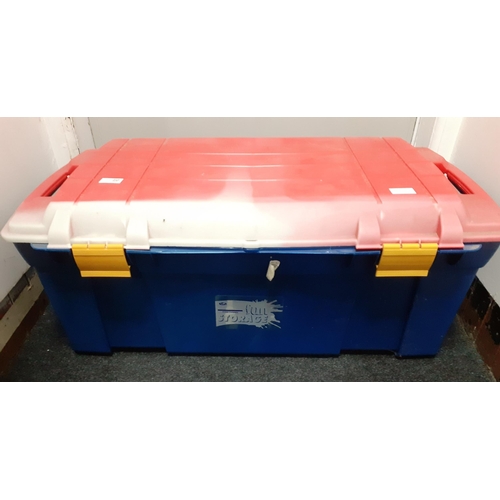 428 - A large plastic red and blue storage trunk approx 87x45x40cm,  has lost some colour on the lid due t... 