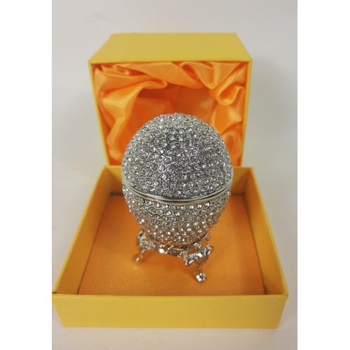 45 - A crystal and platinum coated EGG, brand new in original packaging W2 inches x H3.25 inches, weight:... 