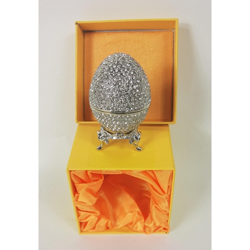 46 - A crystal and platinum coated EGG, brand new in original packaging W2 inches x H3.25 inches, weight:... 