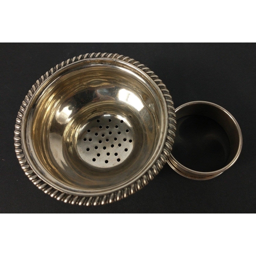 66 - A silver tea strainer hallmarked Edinburgh 1815, possibly by William & Patrick Cunningham, 8cm d... 