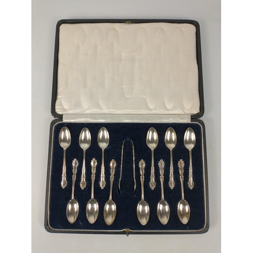 71 - A boxed set of 12 silver teaspoons and pair of tongs, hallmarked London 1920, weight 142g#82