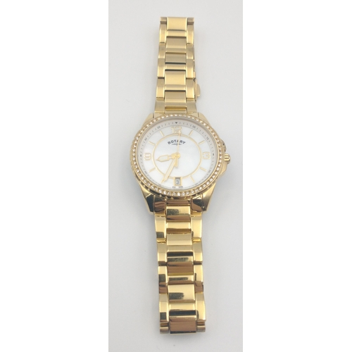 88 - A quality ladies ROTARY wristwatch complete with a ring of bling white decorative stones surrounding... 