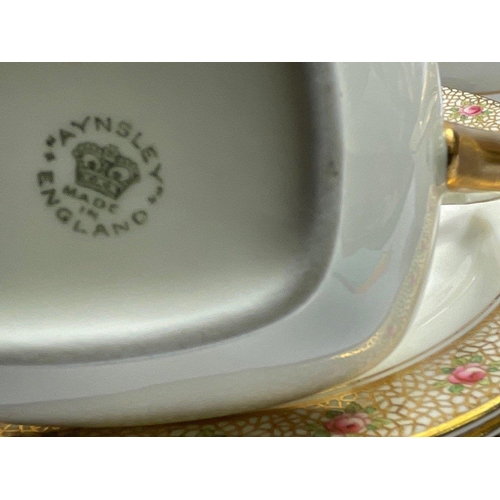 128 - AYNSLEY Fine Bone China Rose-bud and gilt decorated 6 cup tea service with 6 accompanying saucers an... 