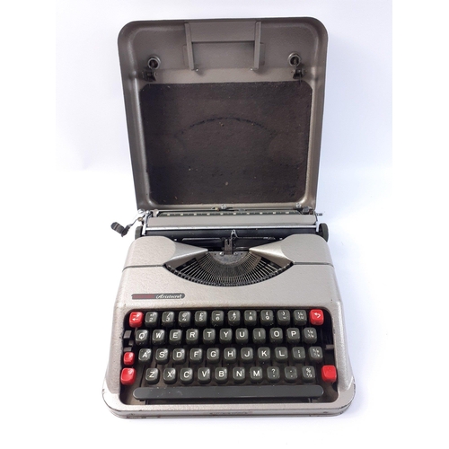 156 - EMPIRE ARISTOCRAT typewriter contained within its own metal removeabe cover.  A neat little item.  M... 