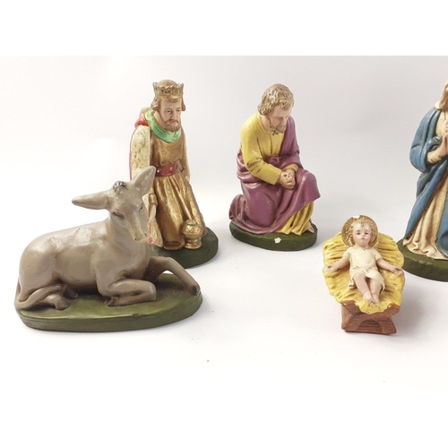 161 - An interesting older Nativity set of ceramic figures to include Mary, Joseph, Baby Jesus, three Wise... 