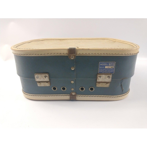 169 - A vintage suitcase record player in cream and blue, marked on back 'Cheney England', 'Model HF12 ser... 