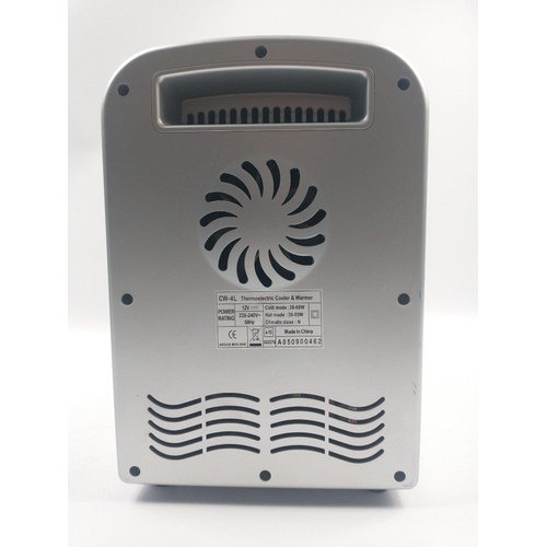 173 - A versatile mini fridge/heater from ARGOS - can be used AC/DC, to heat or cool, can be used with a c... 