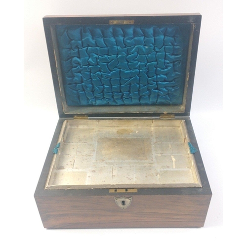 196 - A wooden box 30x20x16cm with a shield-shaped escutcheon and a carrying handle.  Inside has a removab... 