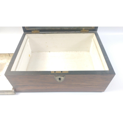 196 - A wooden box 30x20x16cm with a shield-shaped escutcheon and a carrying handle.  Inside has a removab... 