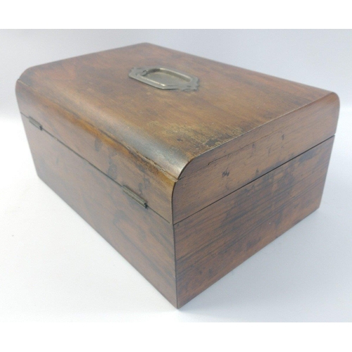 196 - A wooden box 30x20x16cm with a shield-shaped escutcheon and a carrying handle.  Inside has a removab... 