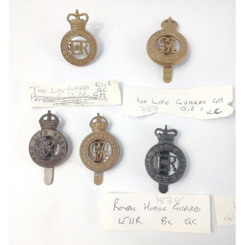 238 - A collection of original Life Guards and Royal Horse cap badges to include GRV Household Battalion B... 