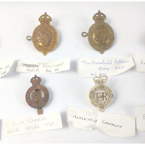 238 - A collection of original Life Guards and Royal Horse cap badges to include GRV Household Battalion B... 