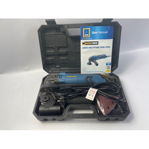 289 - A WORKZONE 300W multifunction-tool with an unopened pack of discs#267