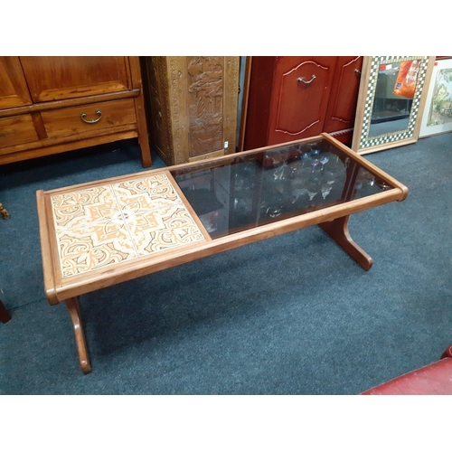 308 - A 1970s coffee table G-Plan one third tiled and two thirds smoked glass. 120 x 49 x 45 cm
These G-Pl... 