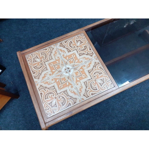 308 - A 1970s coffee table G-Plan one third tiled and two thirds smoked glass. 120 x 49 x 45 cm
These G-Pl... 