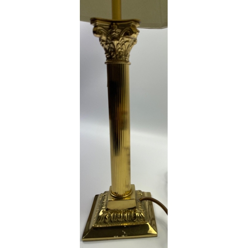 328 - A nice quality brass CORINTHIAN columned table lamp with a quality shade - dimensions of lamp to the... 