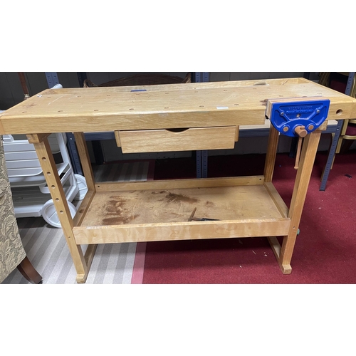 369 - A STURDY proper WORKBENCH COMPLETE with an attached vice, top drawer and lower shelf - dimensions 12... 