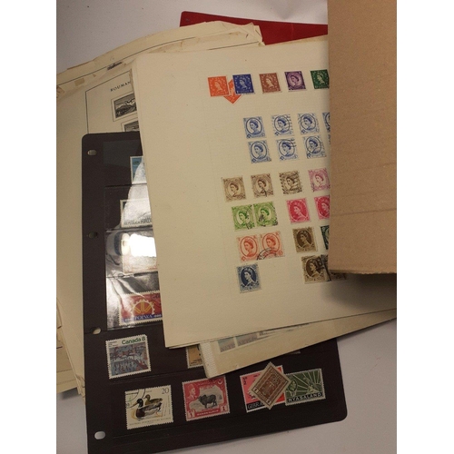 376 - A box containing a large quantity of UK and foreign stamps.  Mainly on disbound album pages, some en... 