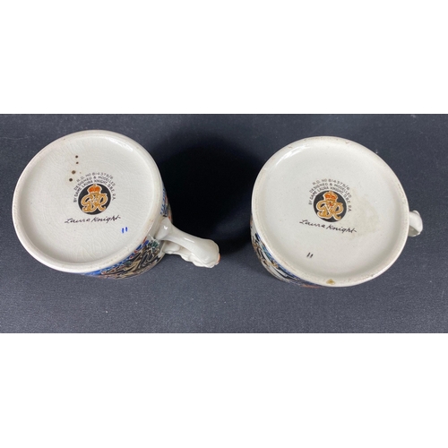 380 - A pair of 1937 King George VI and Queen Elizabeth coronation mugs designed by Dame Laura Knight each... 