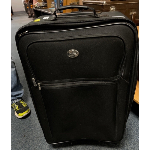 41 - A large expanding travel suitcase on castors with extendable handle in black - height 64cm x width 4... 