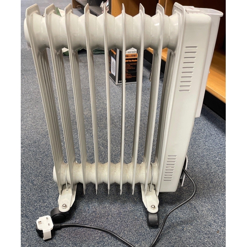 65 - A small electric oil-filled radiator on castors - great for those cold winter nights - dimensions 55... 