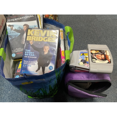 82 - A bag of CD's to include KEVIN BRIDGES and much much more and also a collection of NINTENDO games to... 