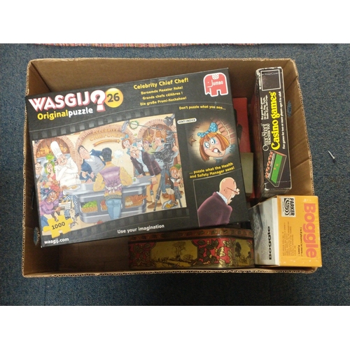 88 - A mixed box to include 2 1000 piece WASJIG jigsaw puzzles, a boxed Casino game, a box of chessman  e... 