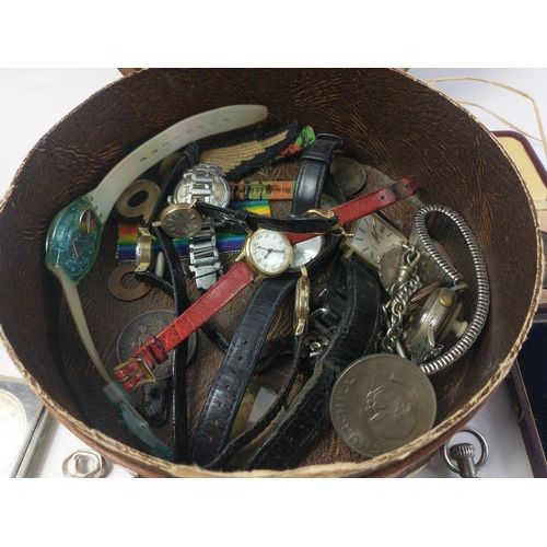 106 - TICK TOCK! A round leather jewellery box (19cm dia) with a collection of (untested) 12 men's and wom... 