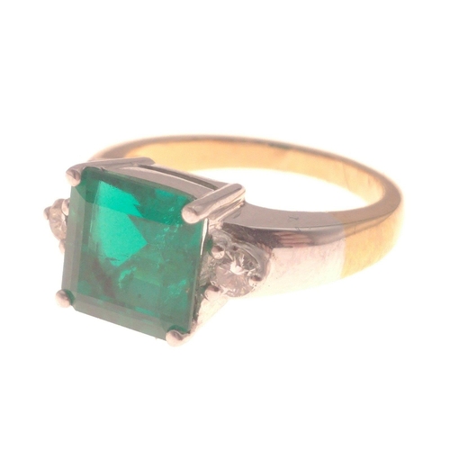 11 - LARGE COLOMBIAN EMERALD! 
18ct(750 stamped) yellow and white gold ring with a 4ct Colombian Emerald ... 