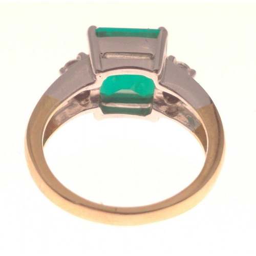 11 - LARGE COLOMBIAN EMERALD! 
18ct(750 stamped) yellow and white gold ring with a 4ct Colombian Emerald ... 