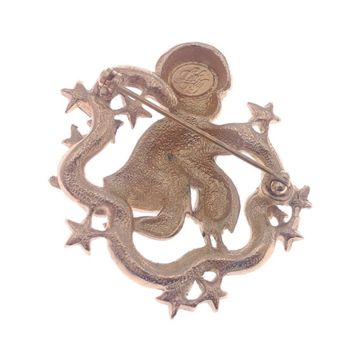 118 - A KIRKS FOLLY gold plated brooch depicting a child sprinkling star dust approx 5cm ling#118