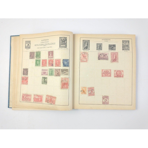 157 - A vintage 23rd edition STRAND STAMP ALBUM dated 1907 with several stamps contained inside from count... 