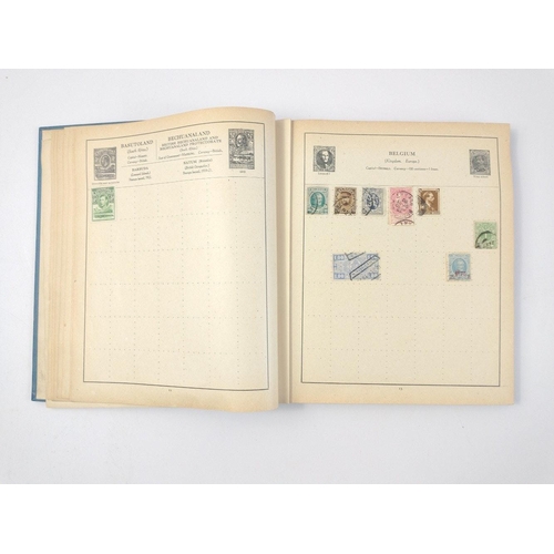 157 - A vintage 23rd edition STRAND STAMP ALBUM dated 1907 with several stamps contained inside from count... 