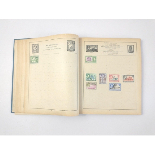 157 - A vintage 23rd edition STRAND STAMP ALBUM dated 1907 with several stamps contained inside from count... 