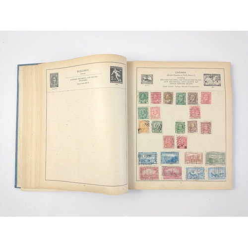 157 - A vintage 23rd edition STRAND STAMP ALBUM dated 1907 with several stamps contained inside from count... 