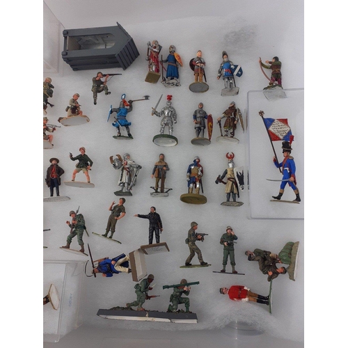 184 - A collection of diecast painted military army figures from various historical eras. Most have regime... 