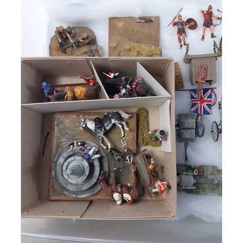 185 - A collection of mainly diecast painted military army figures and groups from various historical eras... 