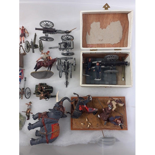 185 - A collection of mainly diecast painted military army figures and groups from various historical eras... 