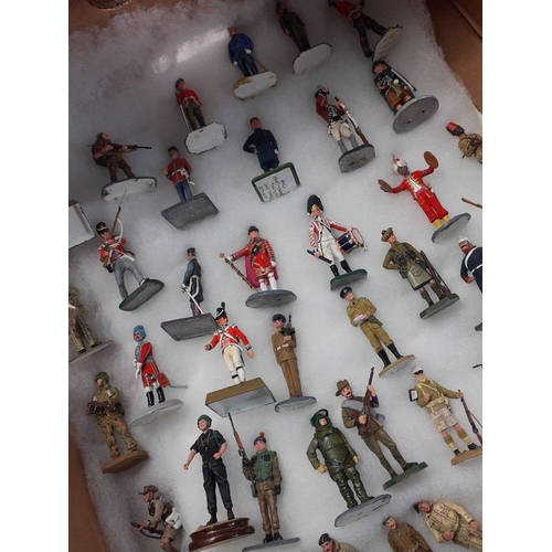 186 - A collection of diecast and plastic painted military army figures from various historical eras. Many... 