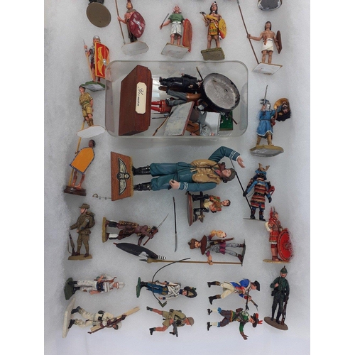 187 - A collection of diecast and plastic painted military army figures from various historical eras. Many... 