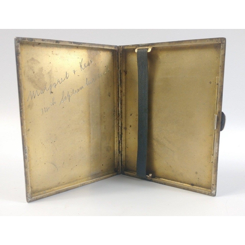 194 - Silver cigarette case with full hallmarks for 1920.  Engine turned with gilt interior and amateur in... 