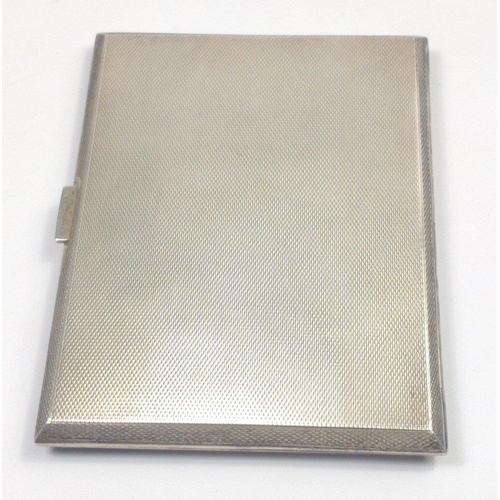 196 - A solid SILVER cigarette case by E.J. Trevitt & Sons of Birmingham and hallmarked for 1920, the ... 