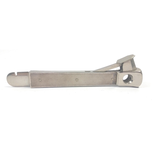 197 - A CIGAR CUTTER with silver handle grips hallmarked for BIRMINGHAM 1959 by the makers S.J. Rose &... 