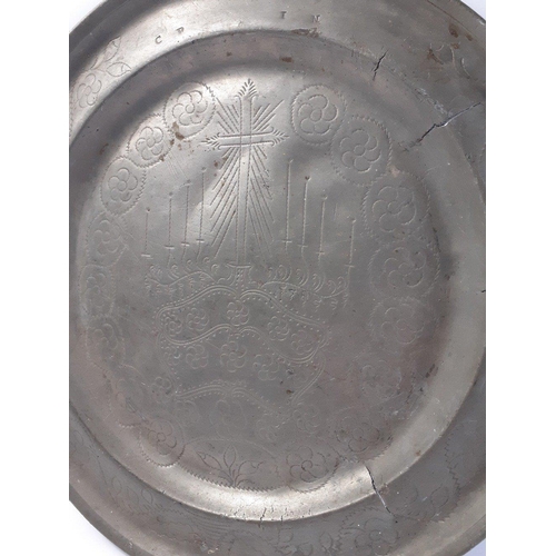 213 - A substantial early eighteenth century Scottish Communion Plate in pewter.  38cm in diameter,  Some ... 