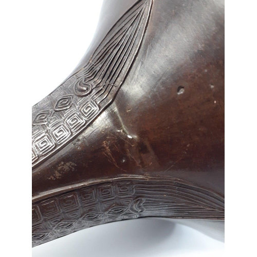 221 - A Chinese metal offertory drinking vessel / trumpet bell vase (20cm). Total gross weight 510g approx... 