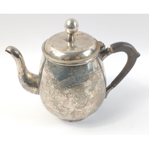 226 - Chinese white metal Dragon teapot standing 15cm high approx and weighing 360g approx.  Rather attrac... 