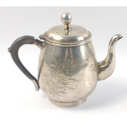 226 - Chinese white metal Dragon teapot standing 15cm high approx and weighing 360g approx.  Rather attrac... 