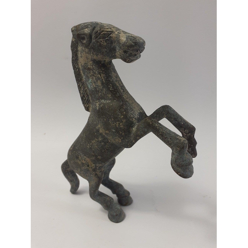 227 - A sprightly bonze horse (16cm long x 11cm high), this was reputedly dug up in a garden in the Selkir... 