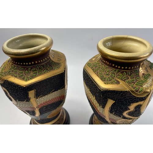 229 - A pair of old decorative JAPANESE SATSUMA VASES on dark wood stands - dimensions each vase 20cm tall... 