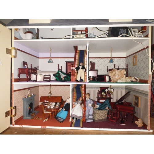 235 - A superb large Dolls House produced by THE DOLLS HOUSE EMPORIUM.  This is a substantial lot with the... 